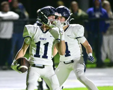 Nate Rogers catches three touchdown passes in Muncy's 31-13 rivalry win vs. Hughesville in Week 10